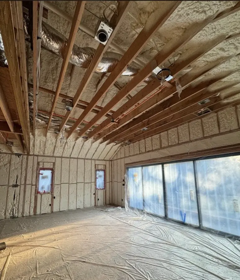 Interior walls and ceiling insulated with spray foam during new construction in Magnolia